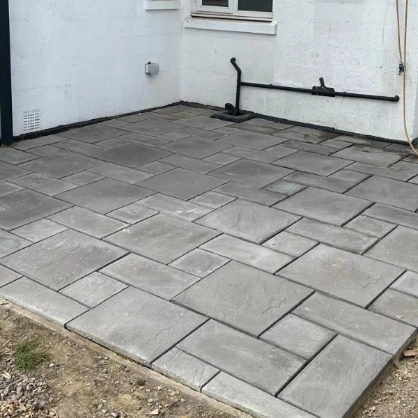 a grey tile patio area